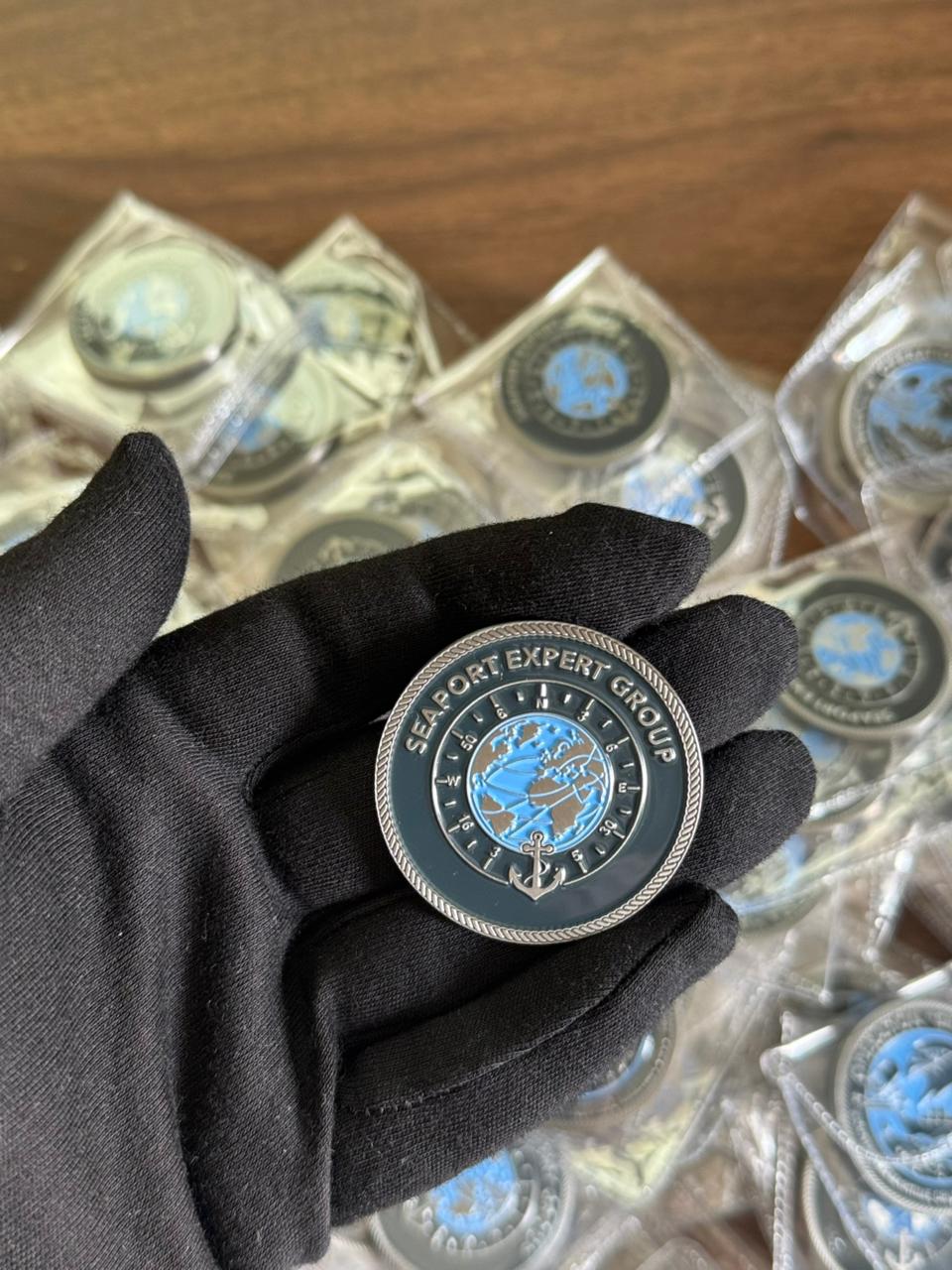 High-quality zinc alloy custom challenge coin for Seaport Expert Group. Features blue enamel globe and anchor detail. Perfect as a military coin, command coin, or personalized coin for recognition.