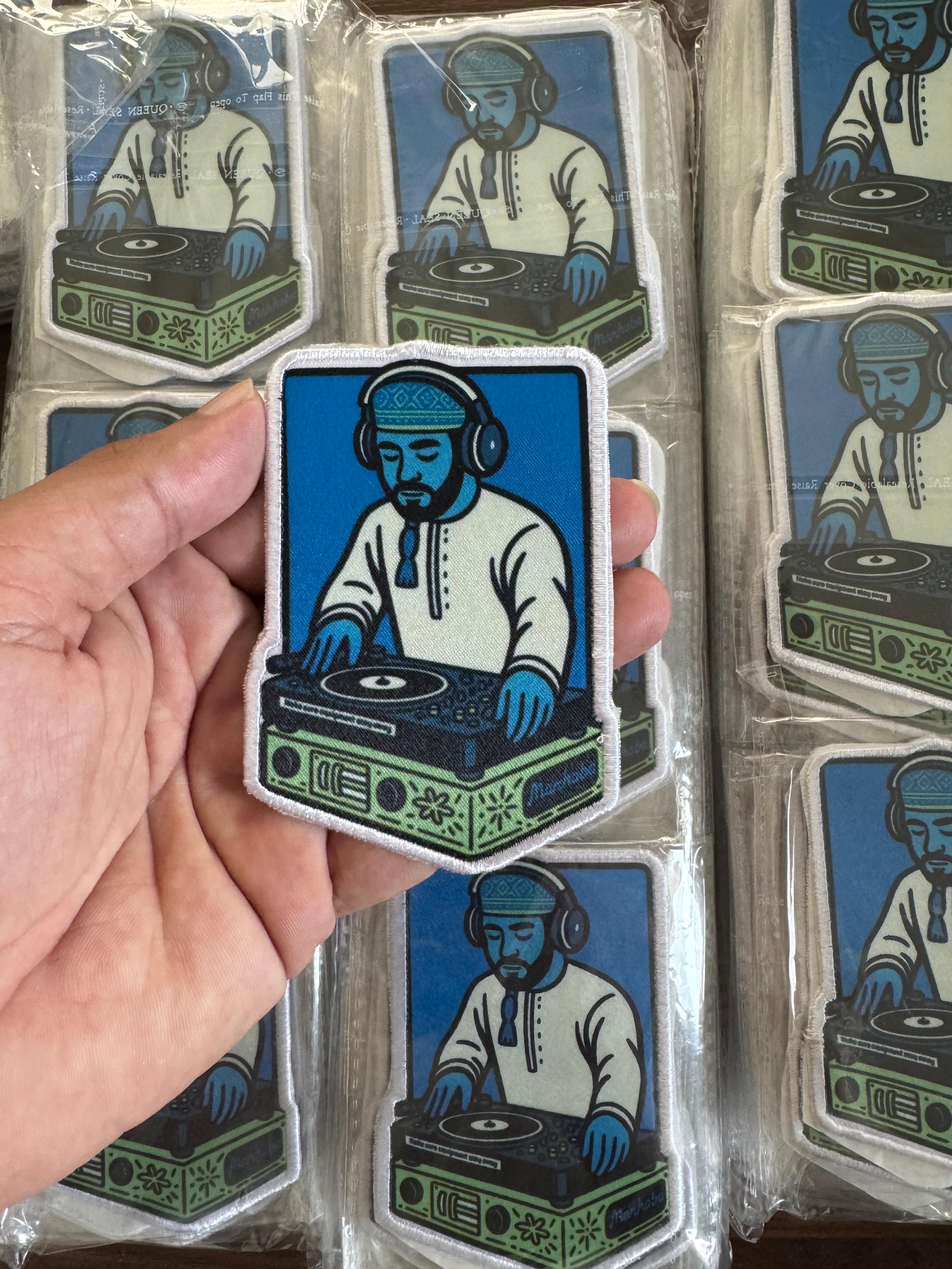 Custom printed fabric patch featuring a DJ illustration in traditional attire, high-quality detailed print.